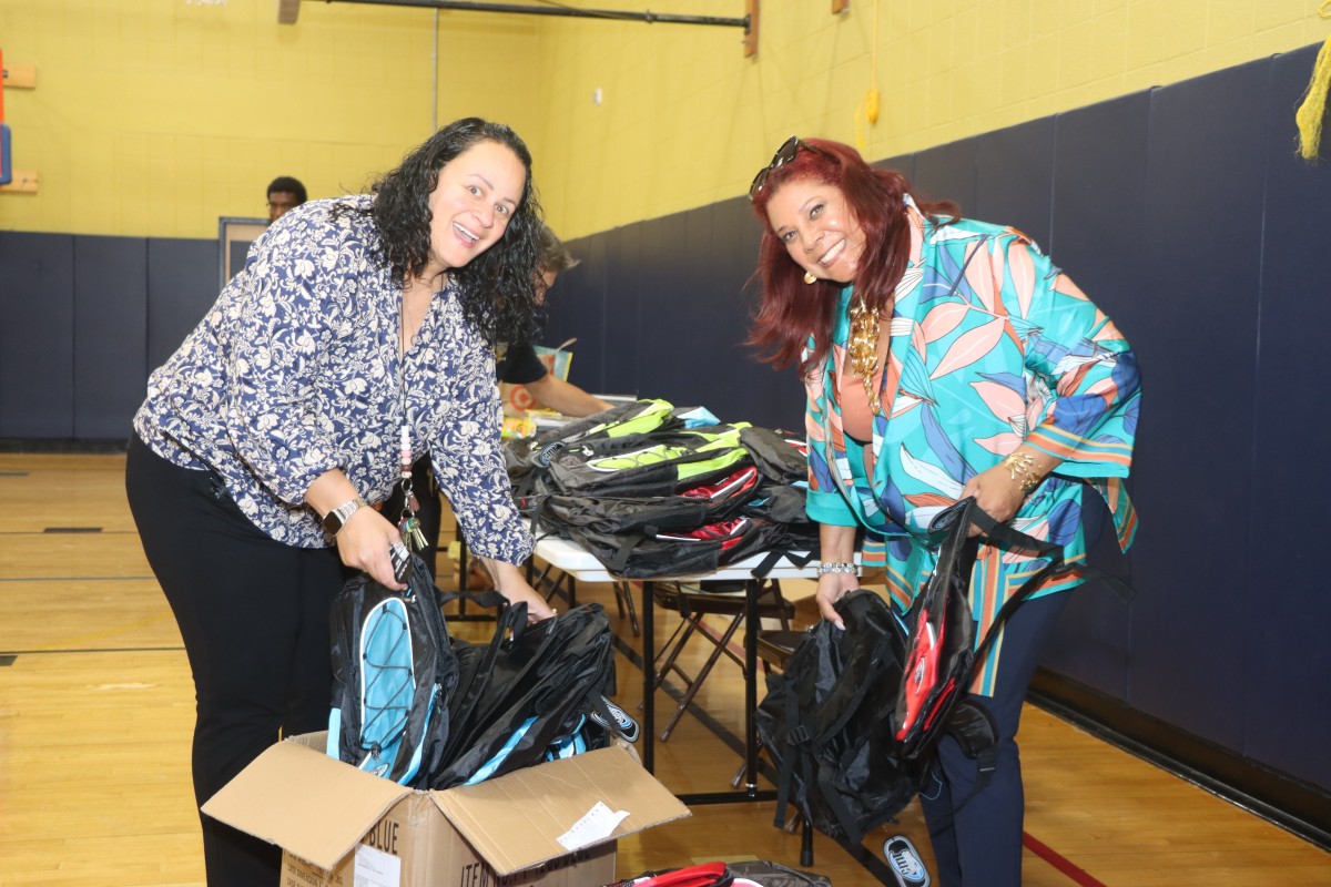 Horizons principals with school supplies